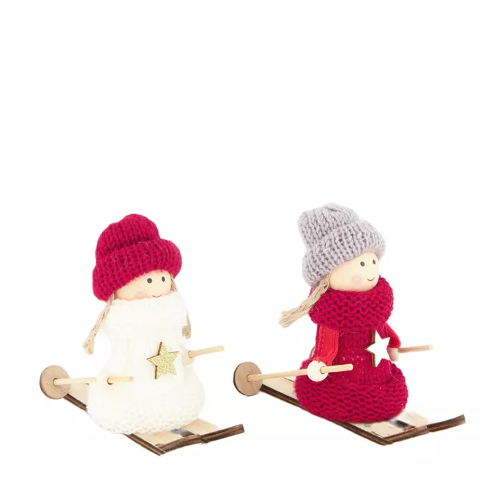 Strickfiguren auf Ski